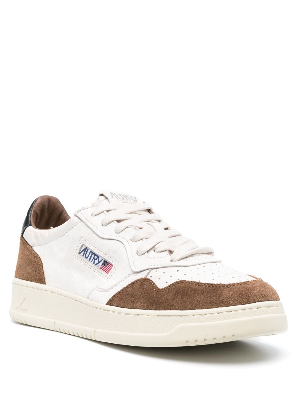 white and brown medalist sneaker