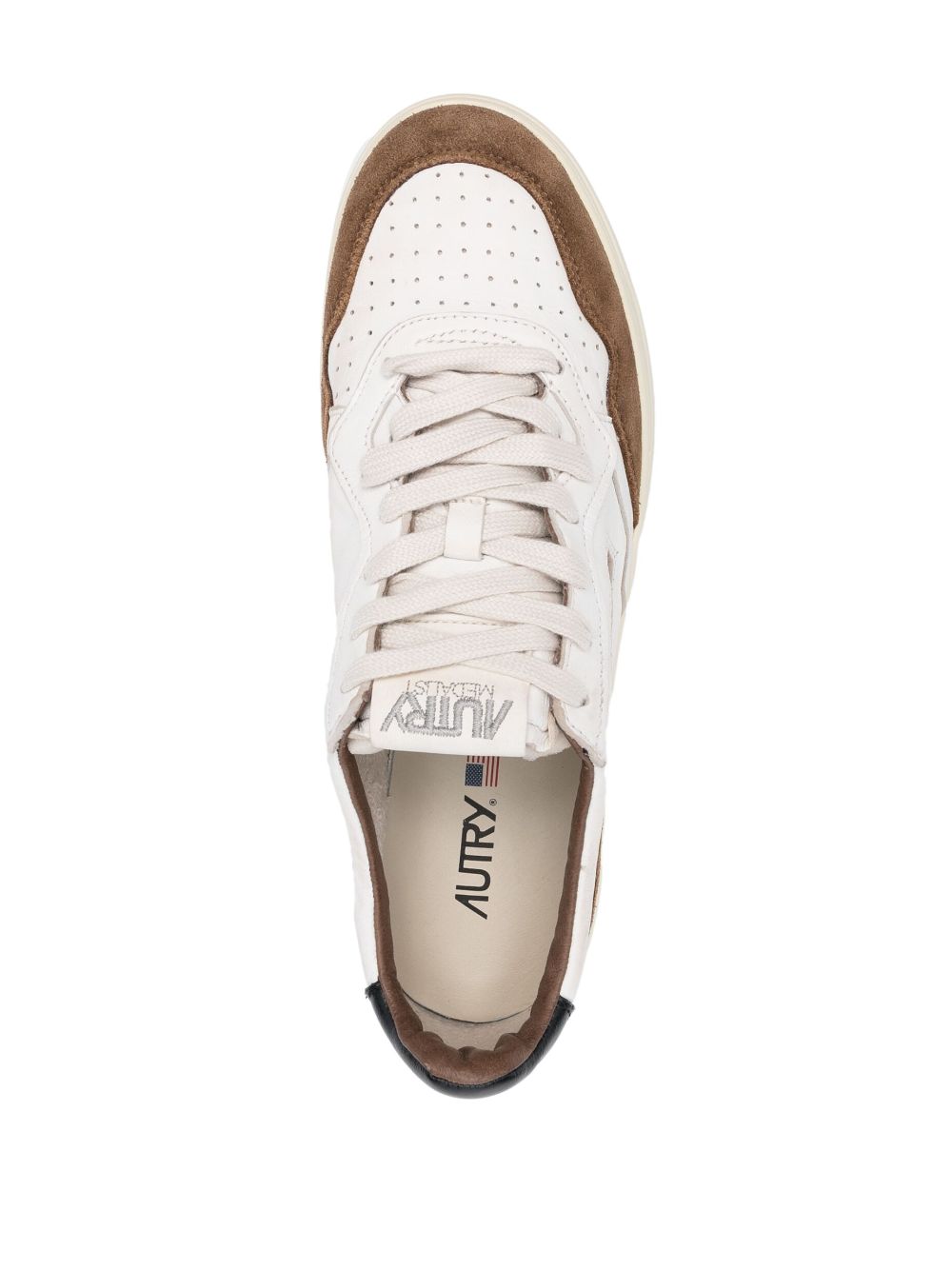 white and brown medalist sneaker