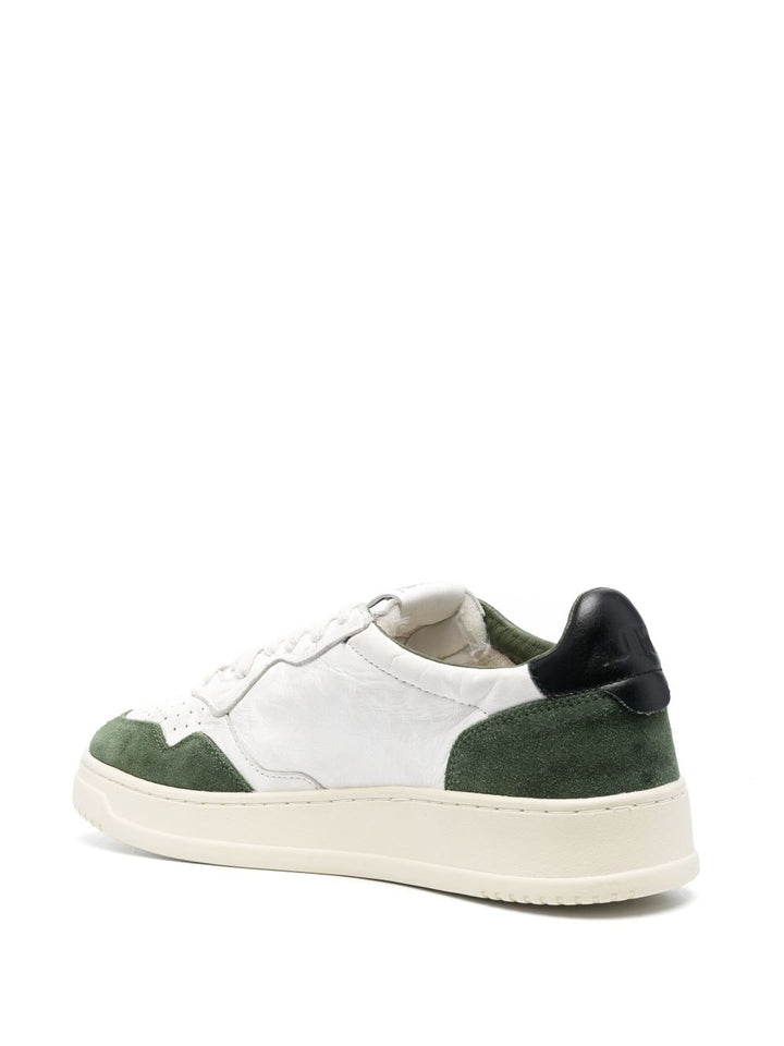 white and green medalist sneaker