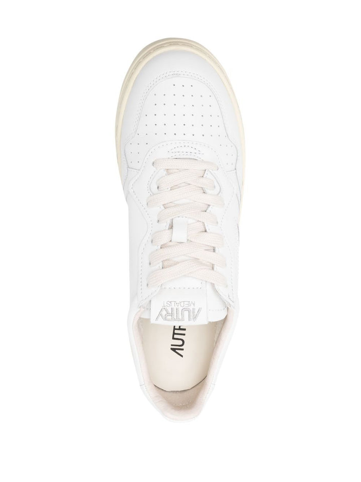 White sneaker with printed sole