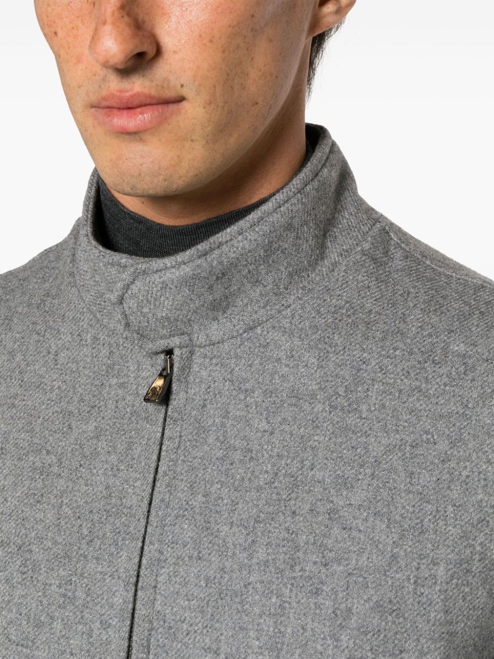 gray padded bomber jacket