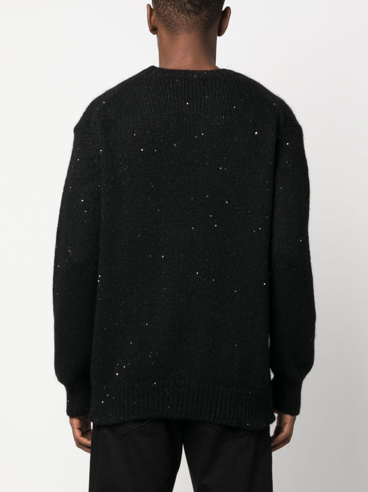 maglione nero con paillettes