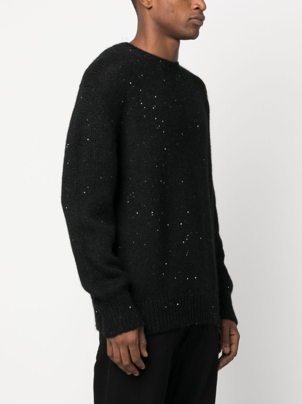 maglione nero con paillettes