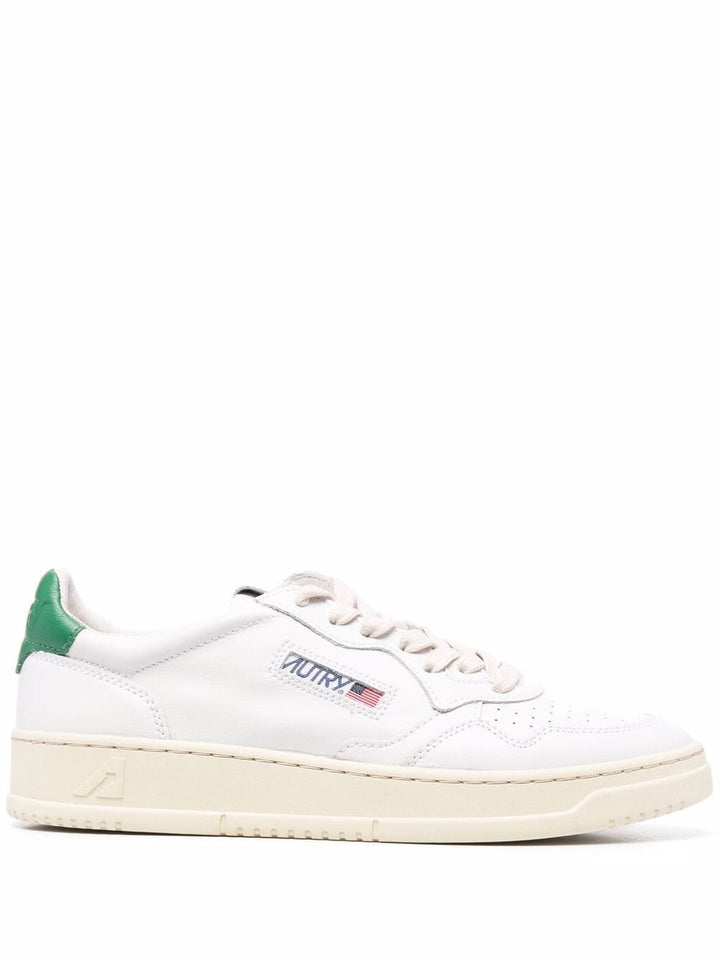 Sneaker bianca talloncino verde