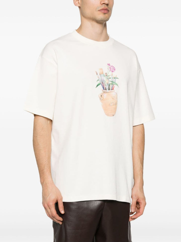 T-shirt crema con stampa a fiori