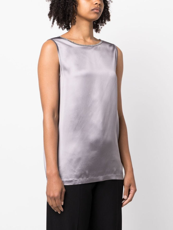 Sleeveless top with decoration