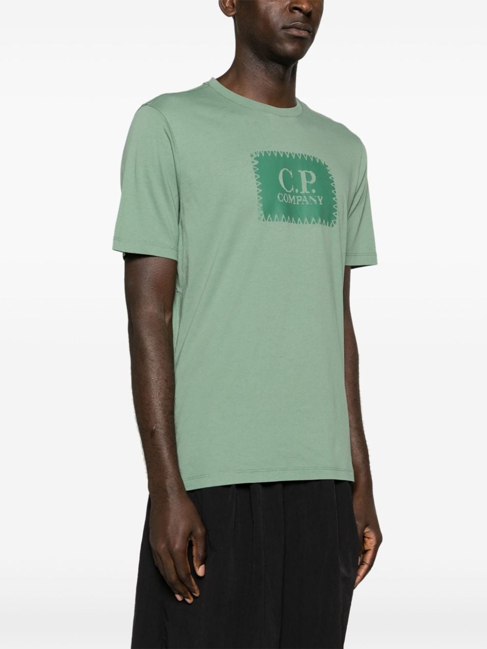 T-shirt verde con logo