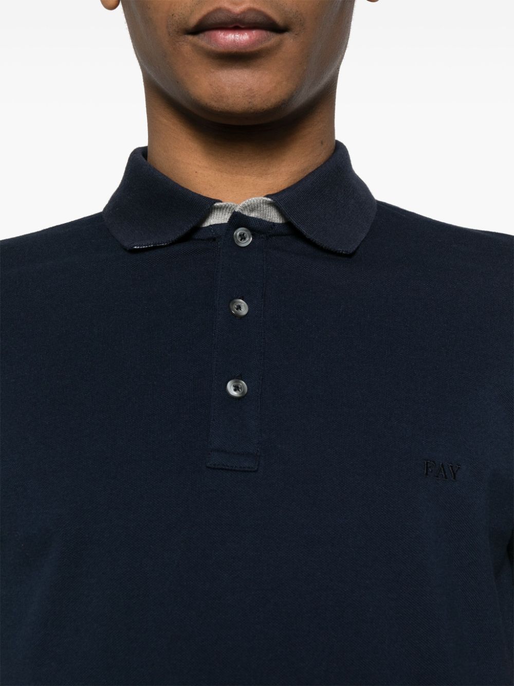Blue polo shirt with embroidery