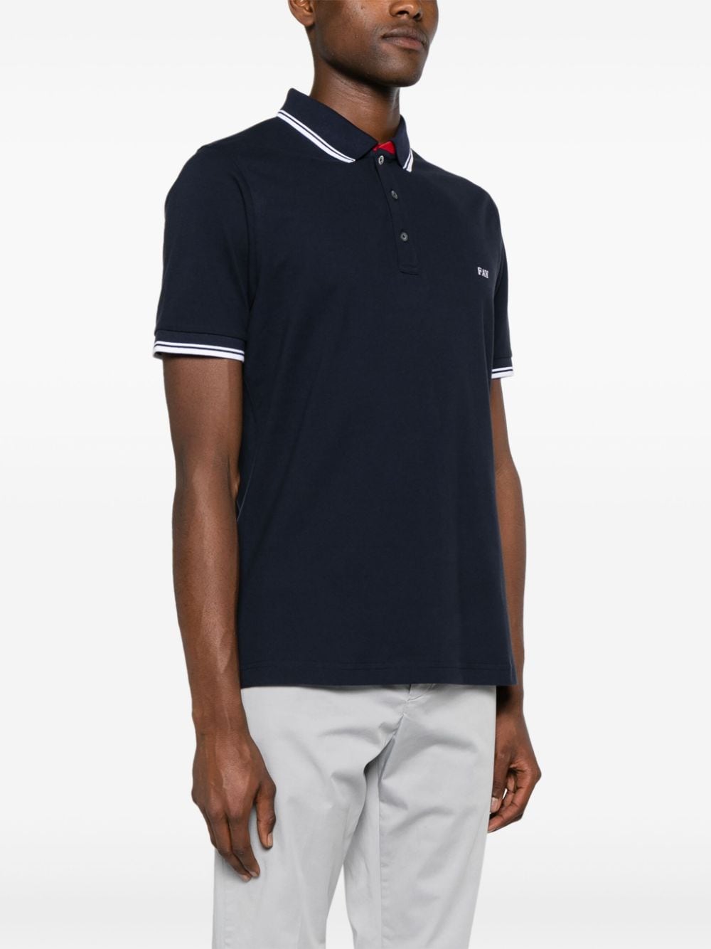 Blue polo shirt with piping