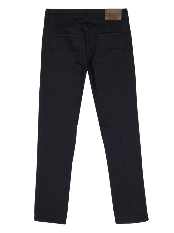 Blue five-pocket trousers