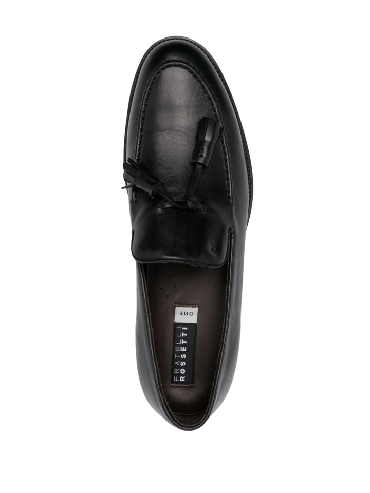 Black leather loafer with tassels