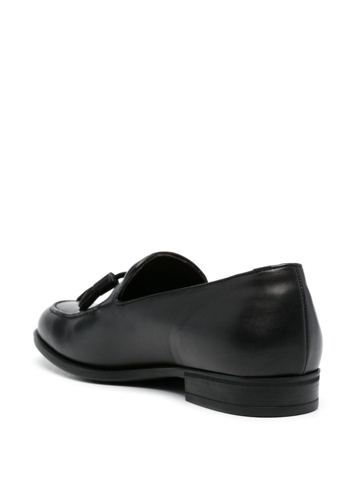 Black leather loafer with tassels