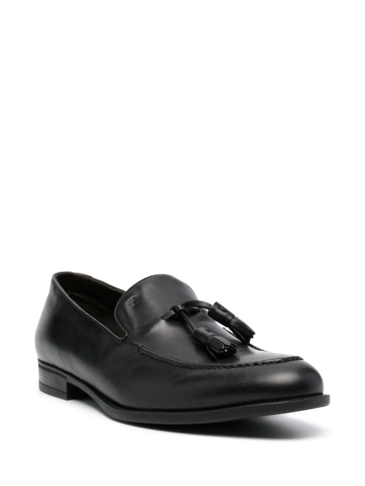 Black leather loafer with tassels