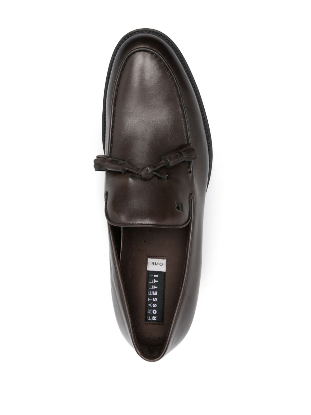 Ebony leather moccasin with tassels