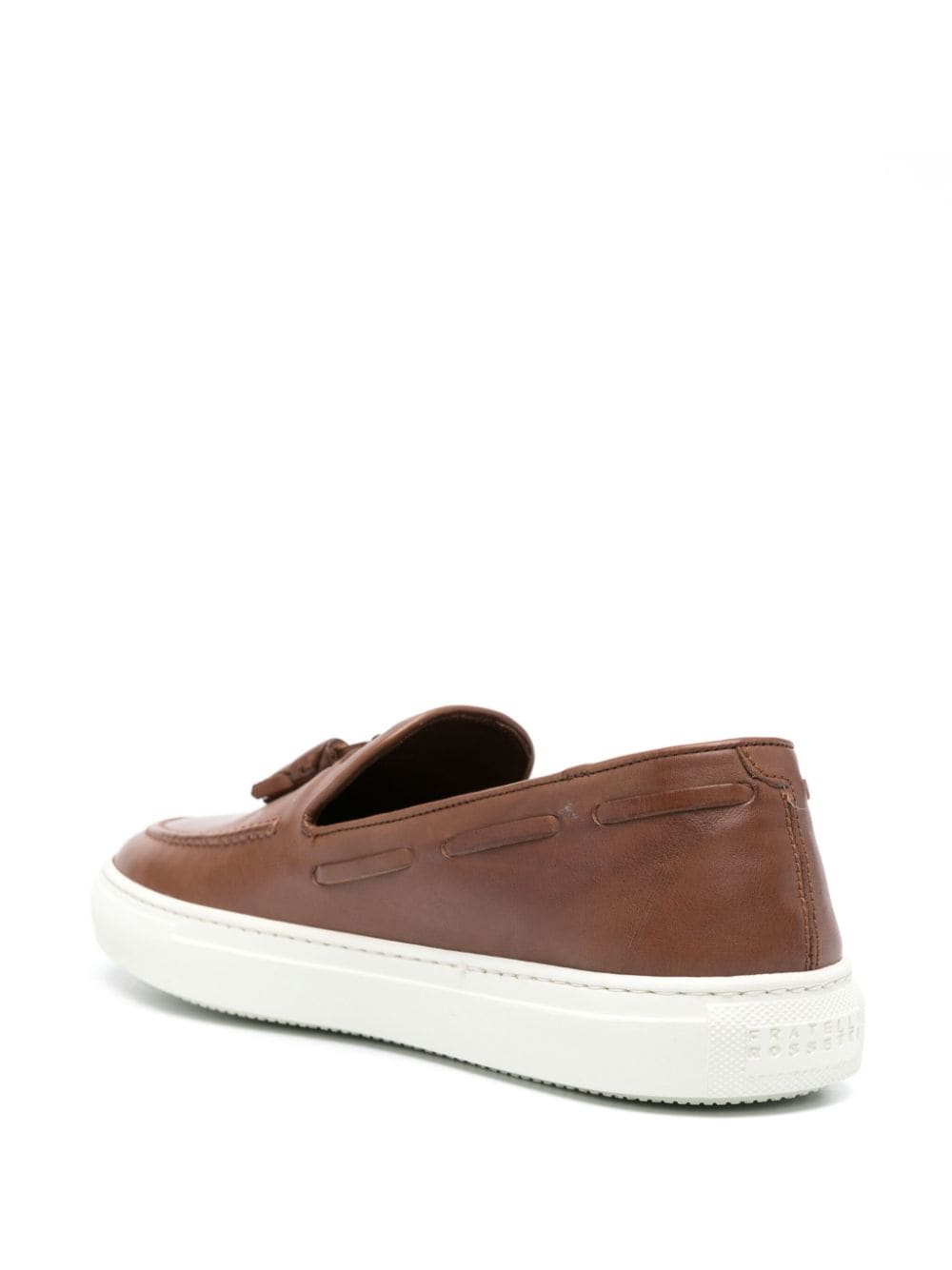 Brown leather moccasin with tassels