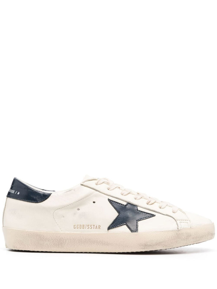 White and blue superstar sneakers