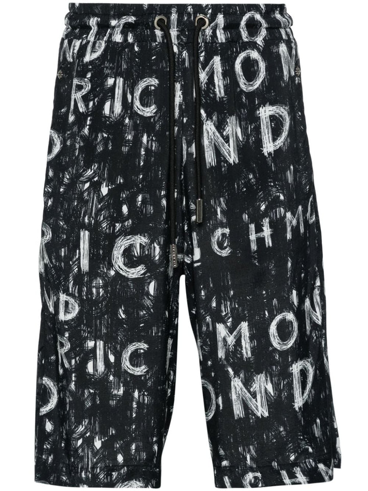 Black Bermuda shorts with all over print