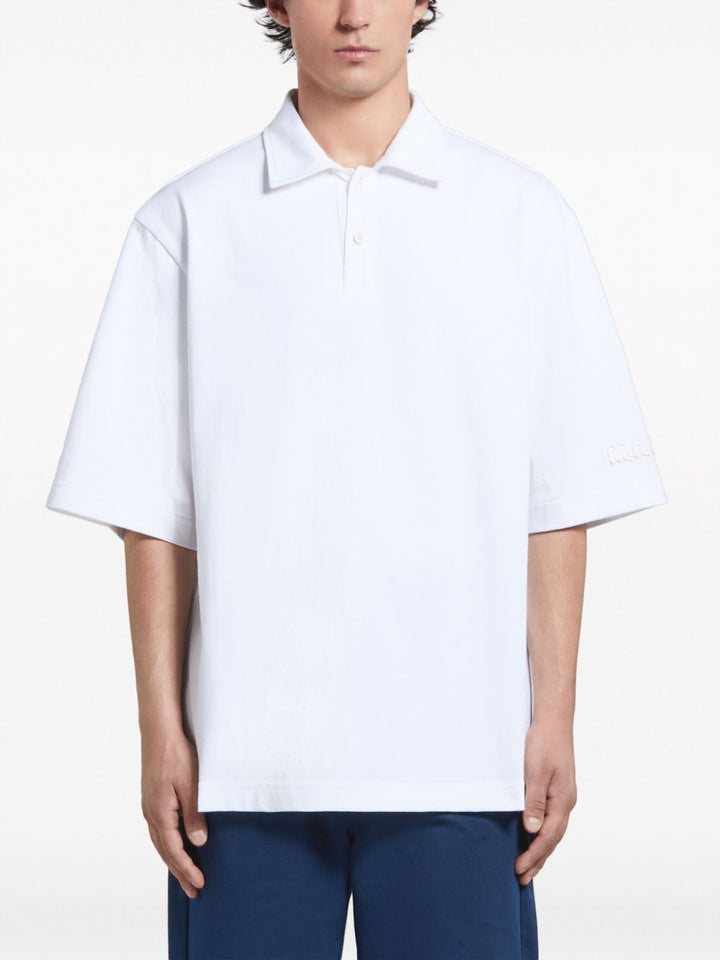 Oversized white polo shirt
