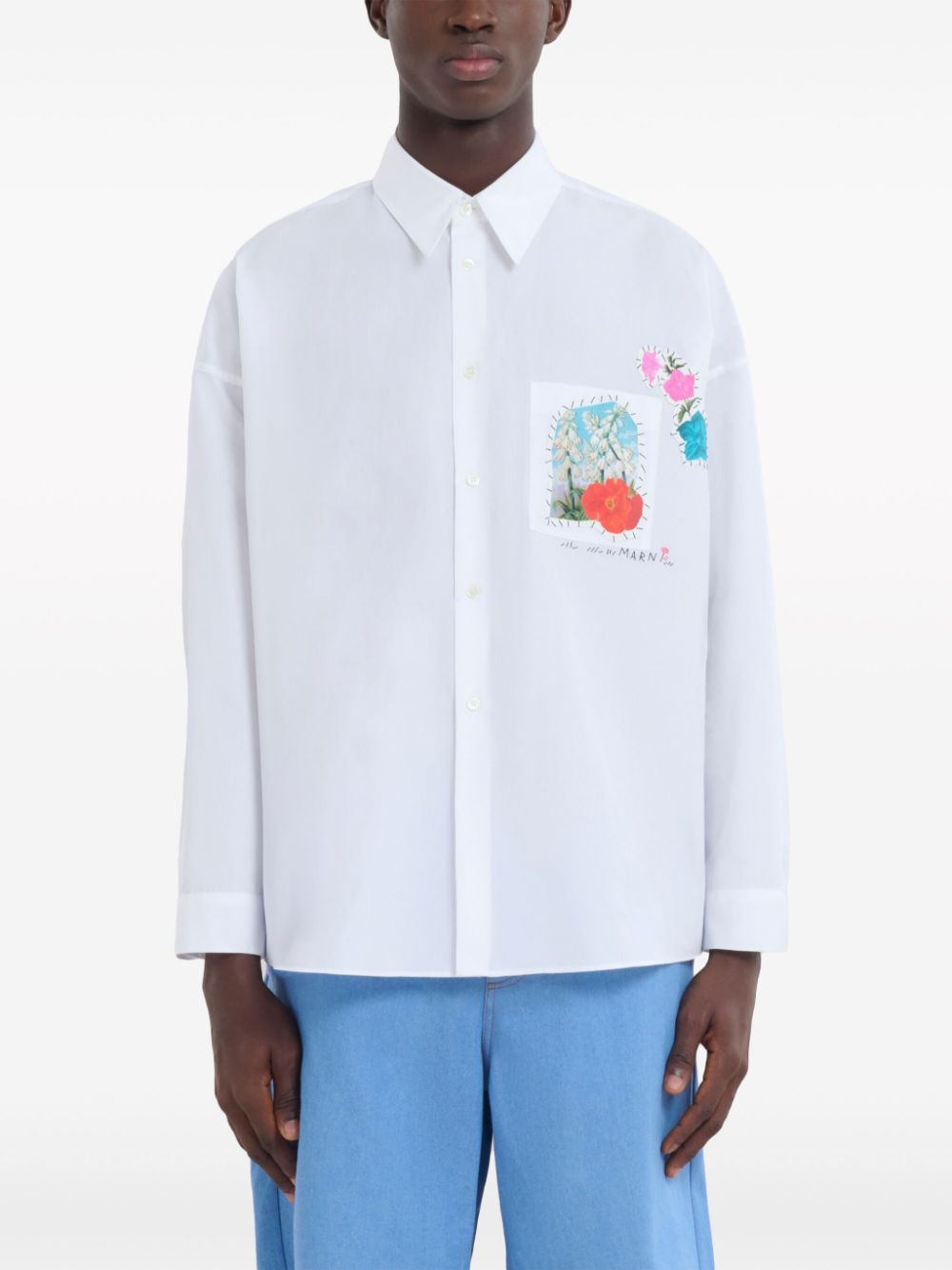 Chemise blanche avec appliqué fleurs