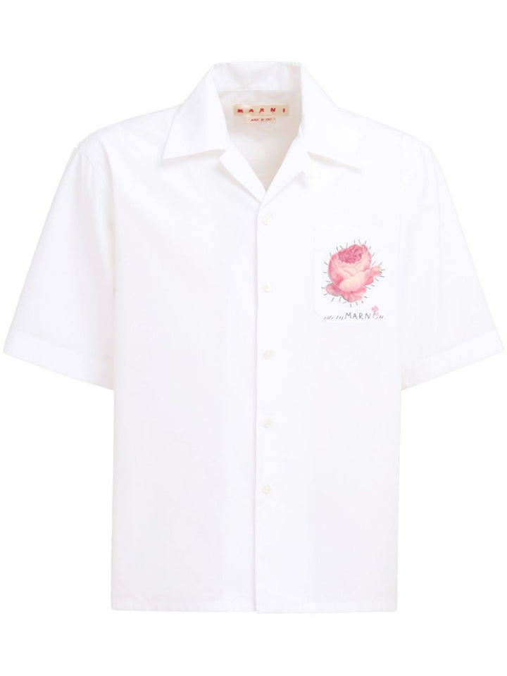 Camicia bianca con applicazione fiore
