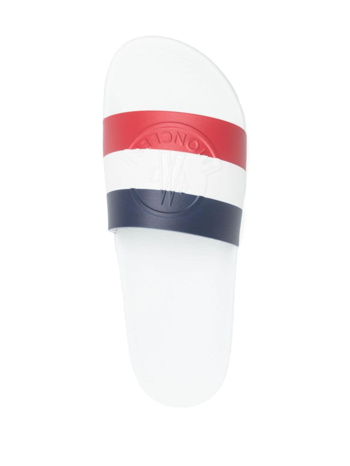 White slipper with multicolor logo