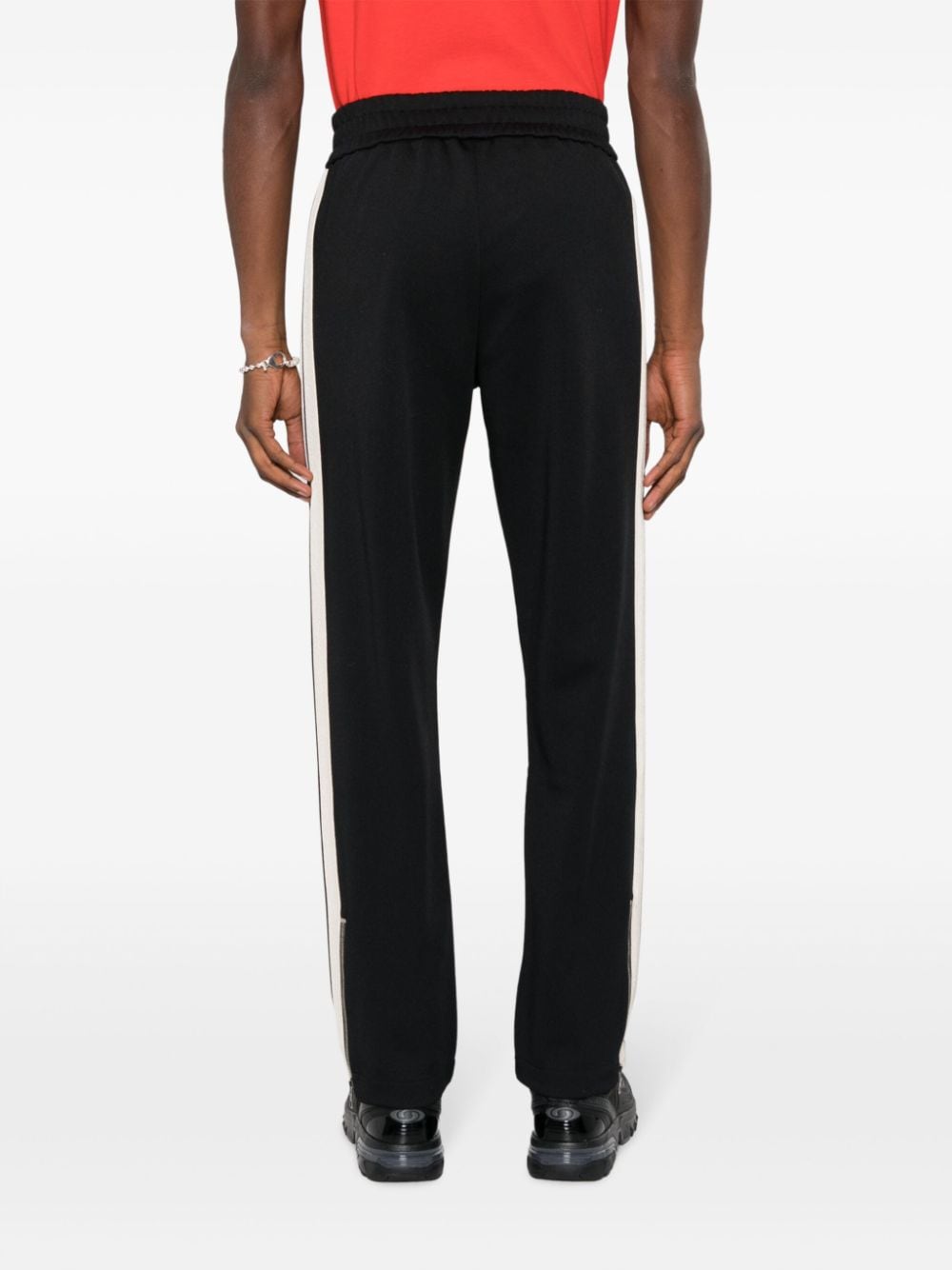 Black track trousers