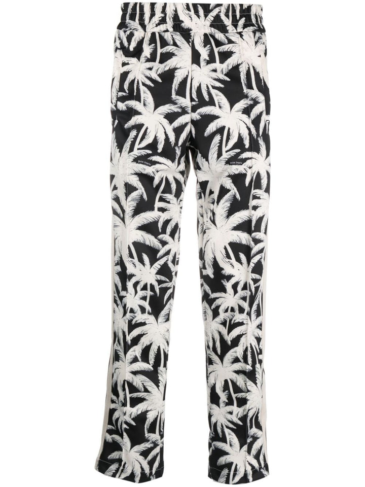 Black trousers with all over palm logo