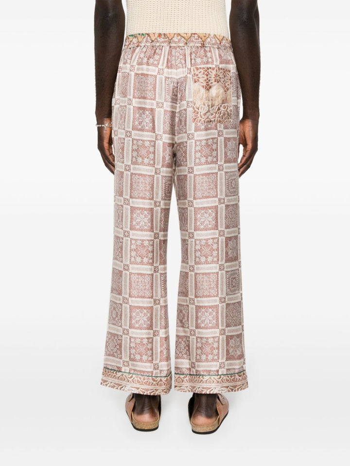 Aloe trousers with beige graphic print