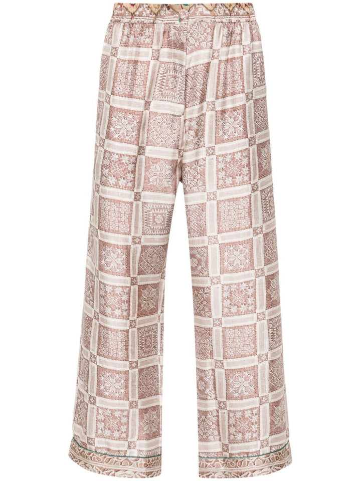 Aloe trousers with beige graphic print