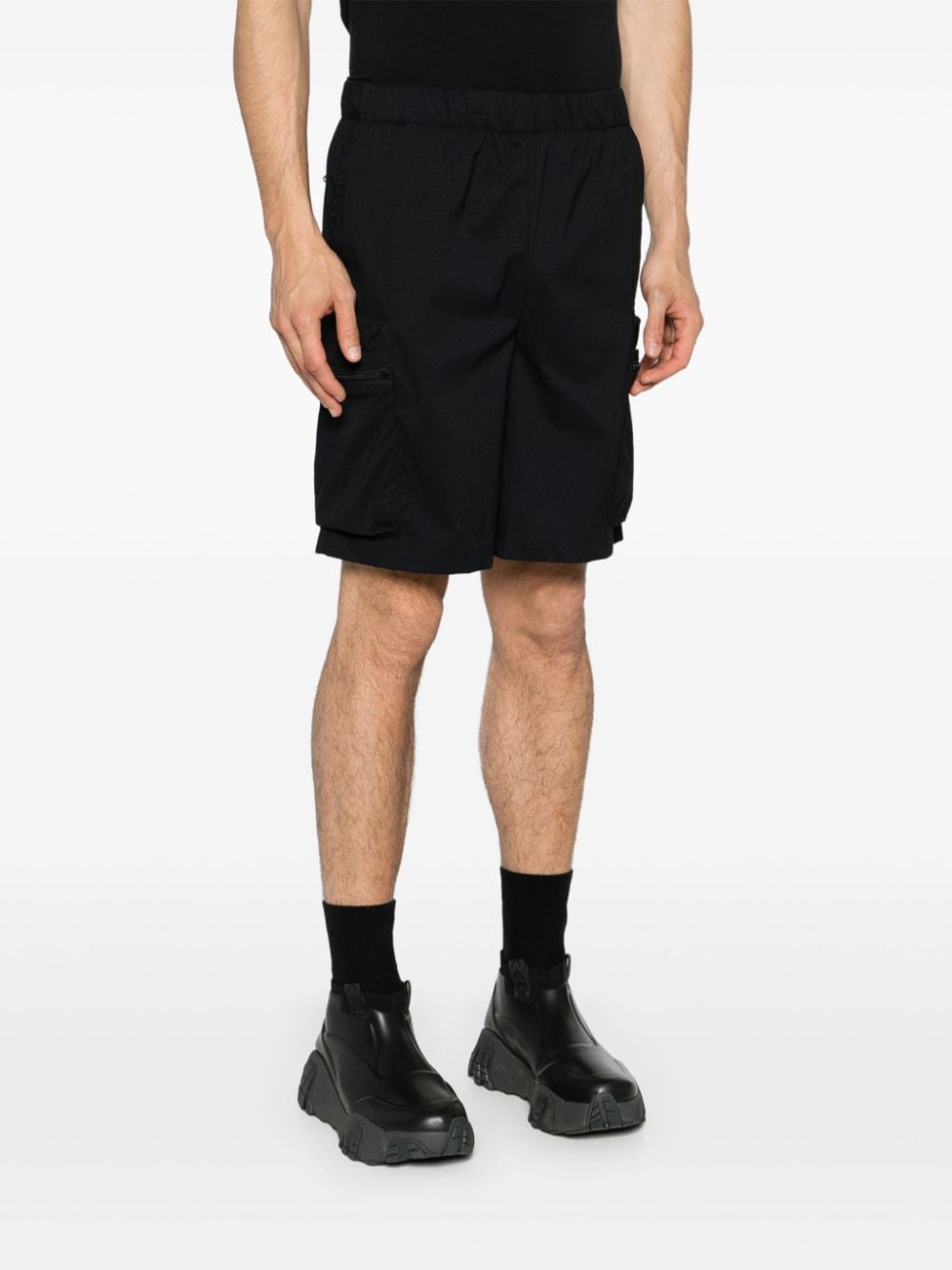 Black Bermuda shorts with pockets