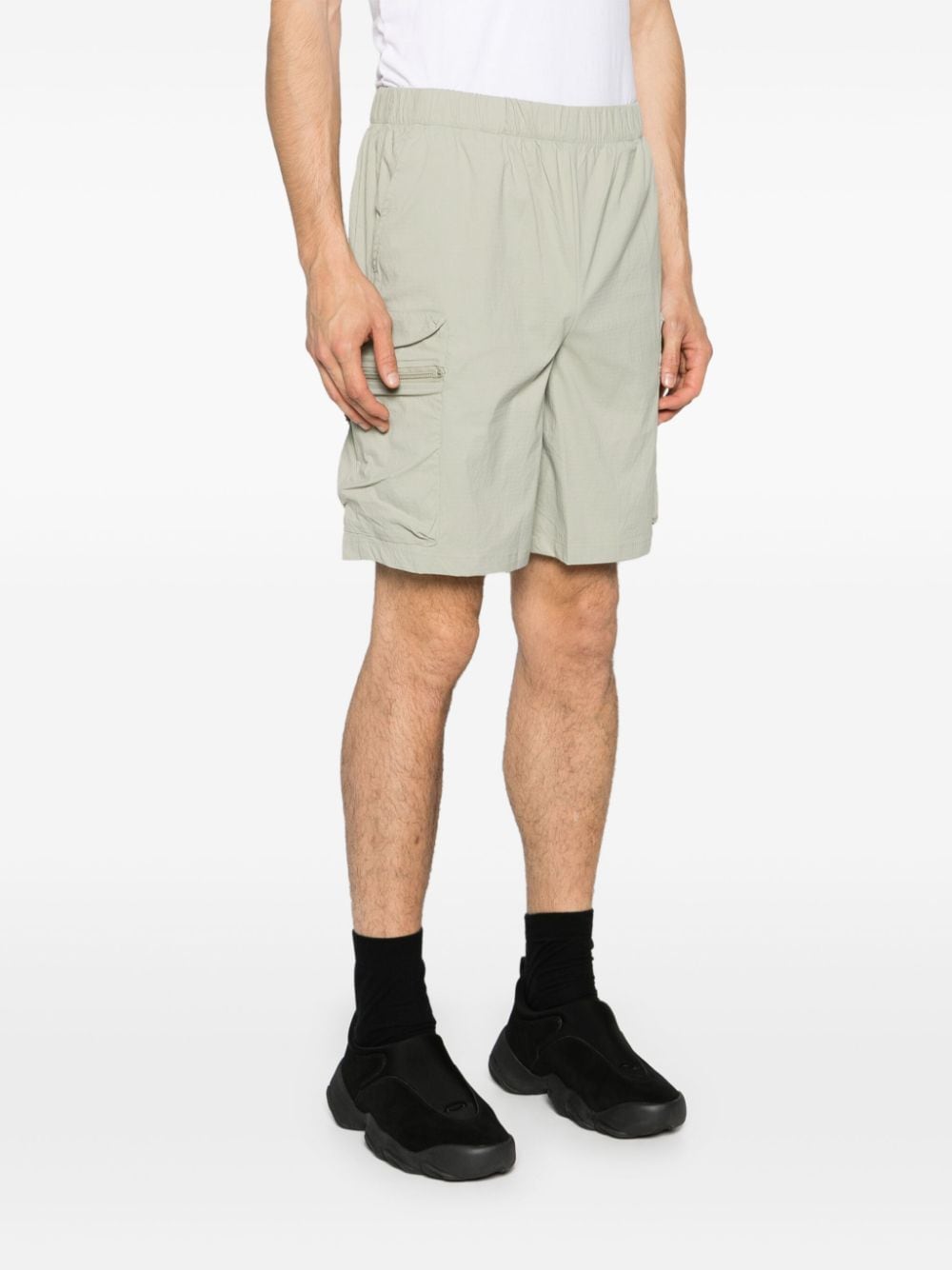 Sage green Bermuda shorts with pockets