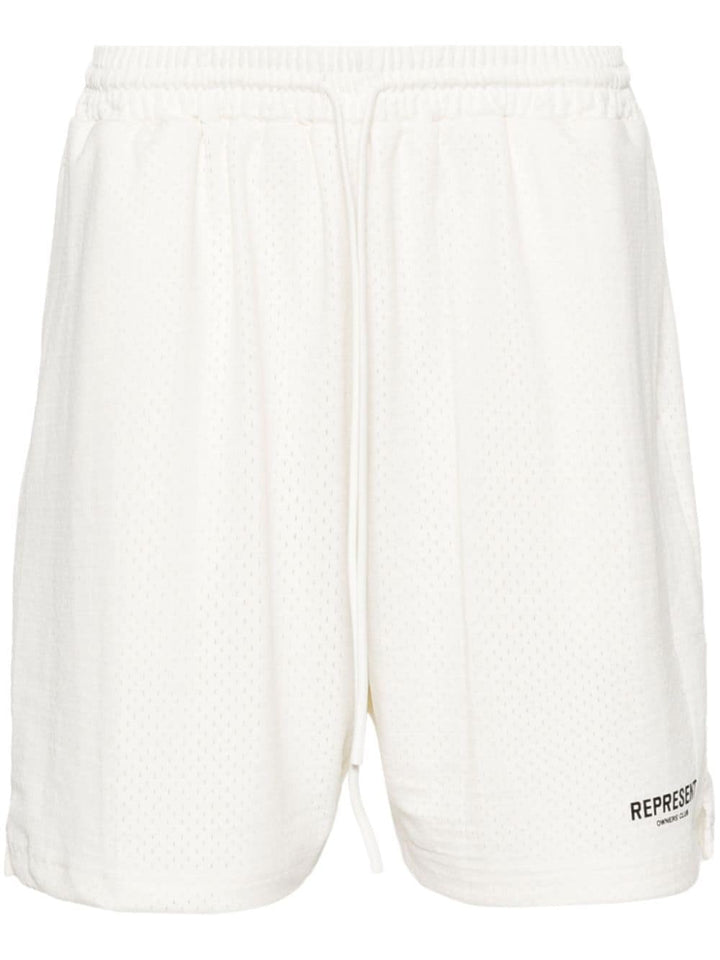 White shorts with perforated design