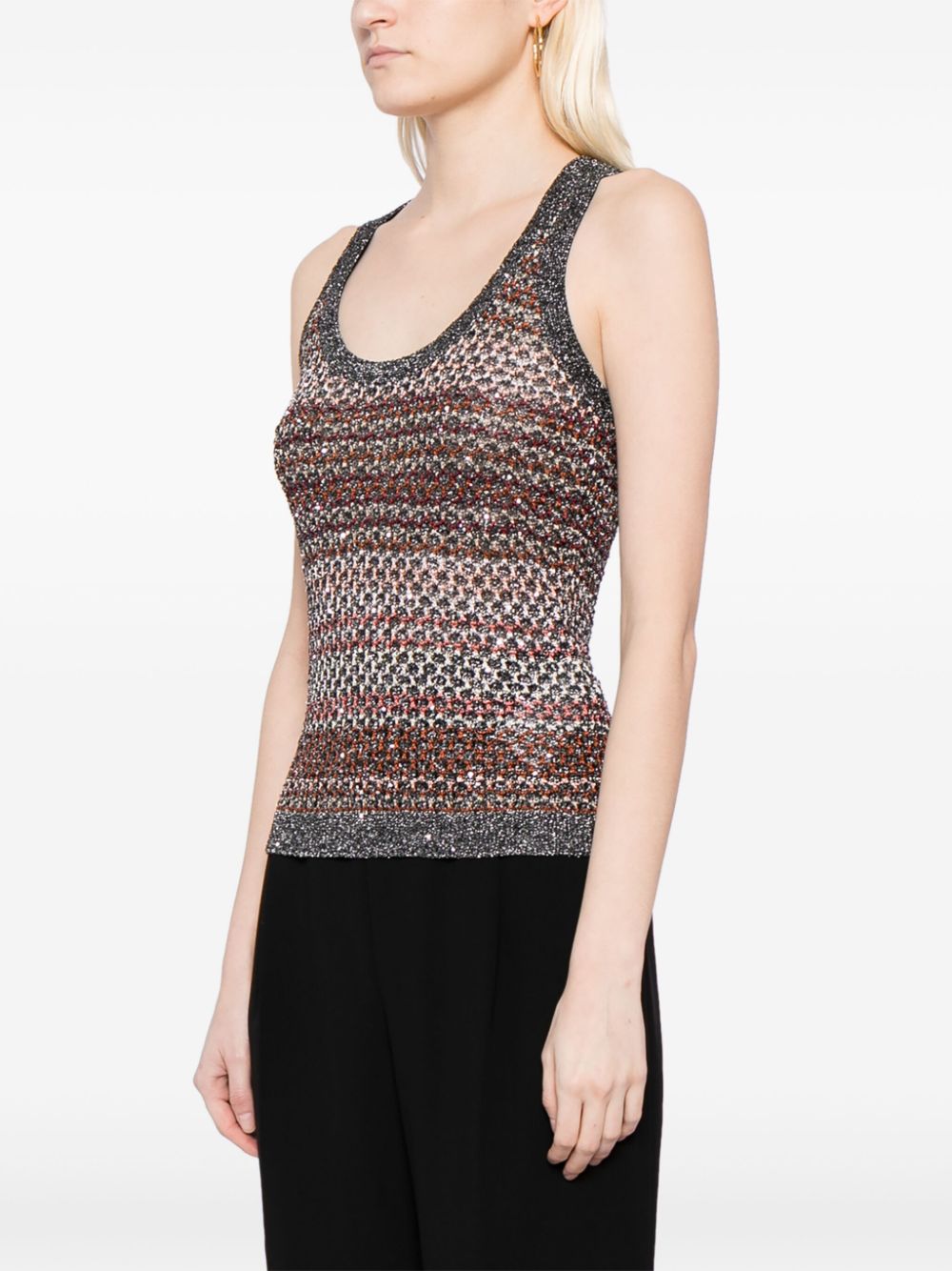 Knitted top with laminated thread