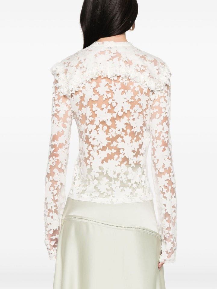 Semi-transparent floral blouse