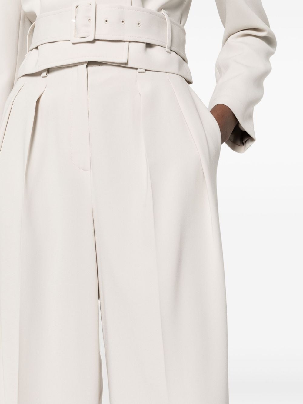 Tailored trousers with pleats