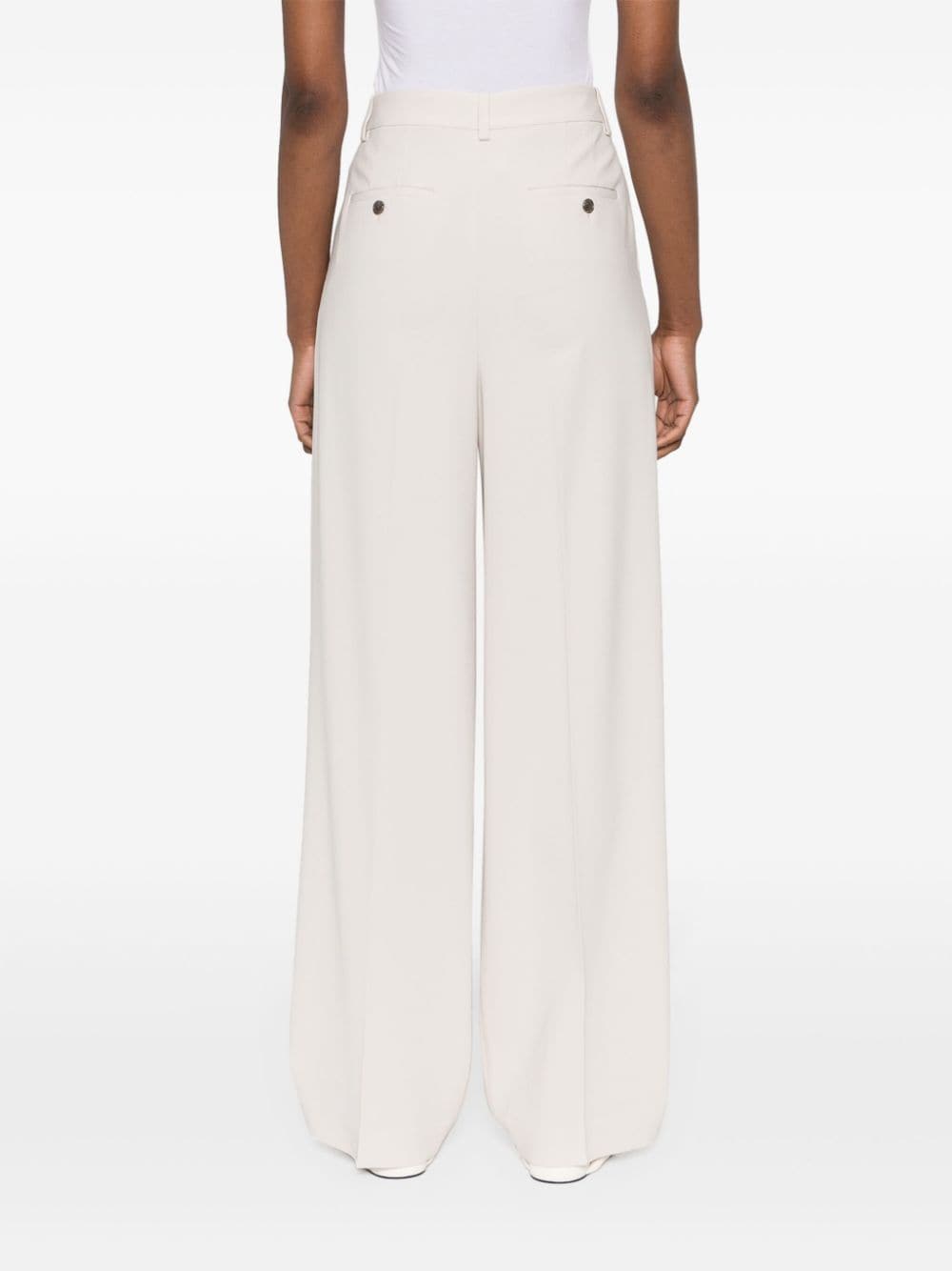 Tailored trousers with pleats