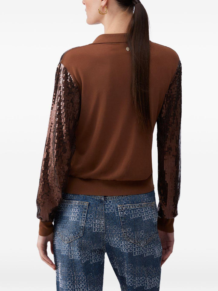 Polo con paillettes 
