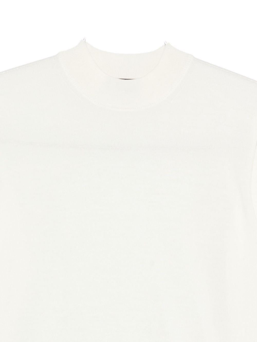 Maglione bianco a collo alto 