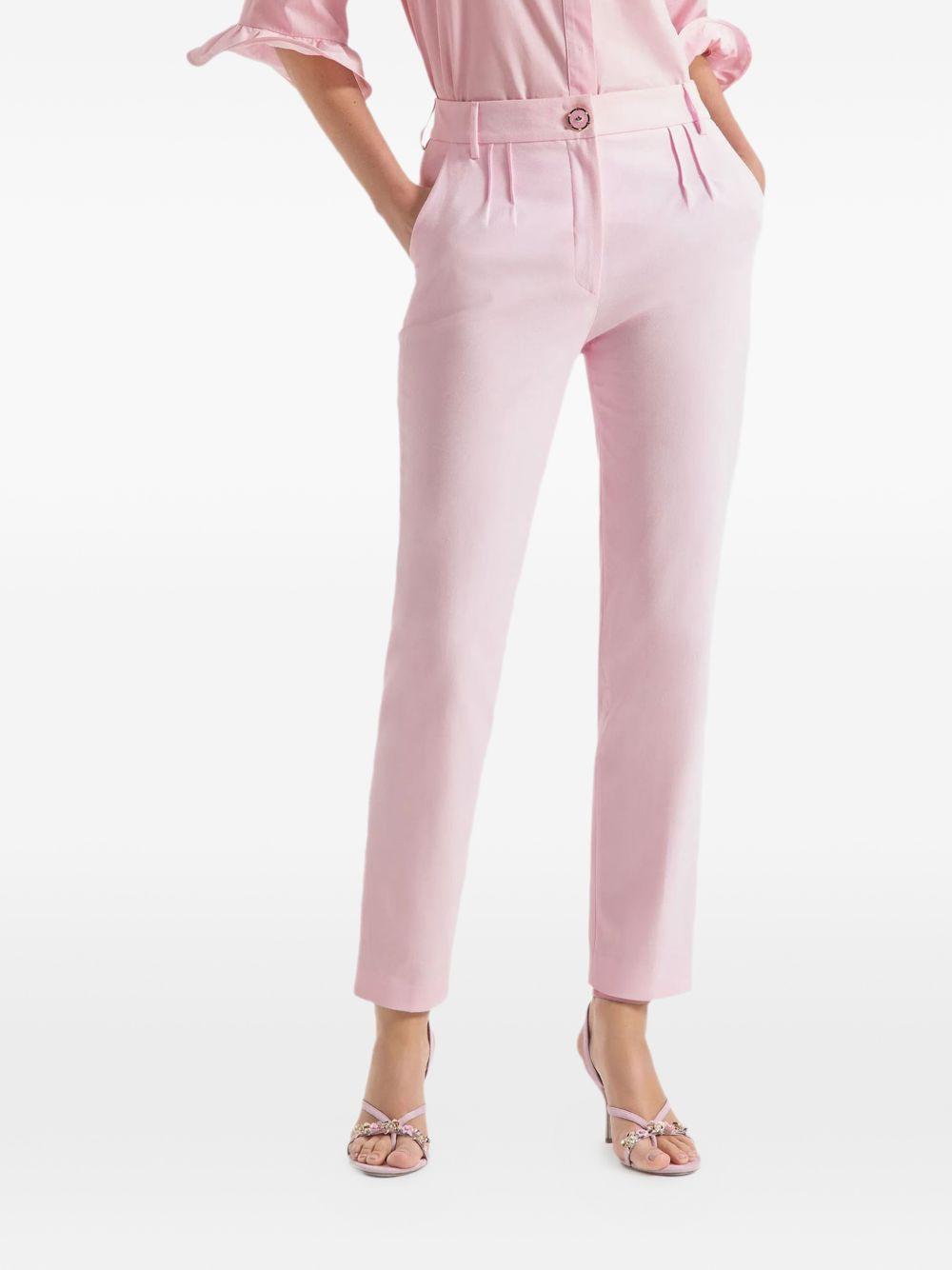 Pantaloni con piega 
