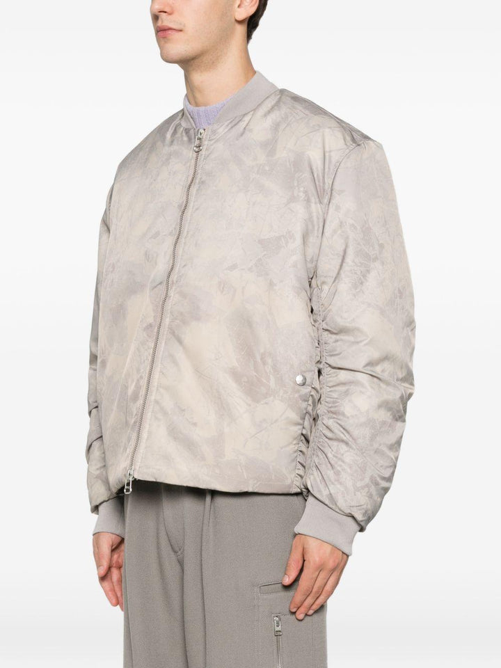 Bomber a colori neutri con zip 