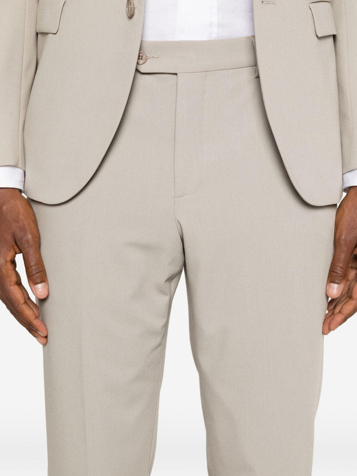 Abito beige monopetto con rever a punta 