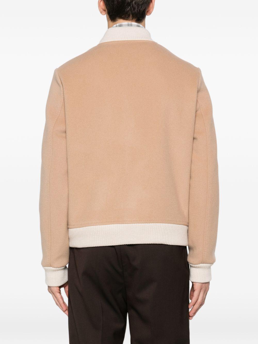 Bomber beige con bottoni 