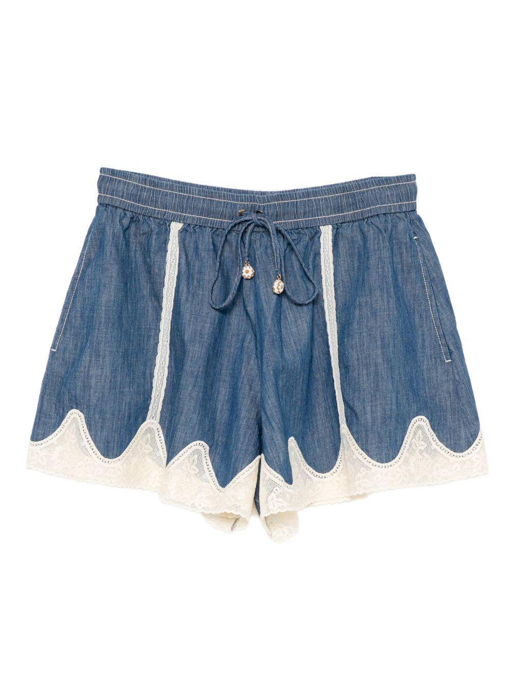 Shorts con inserti 