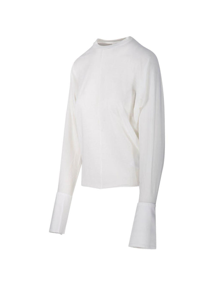 Maglia con polsini camicia 