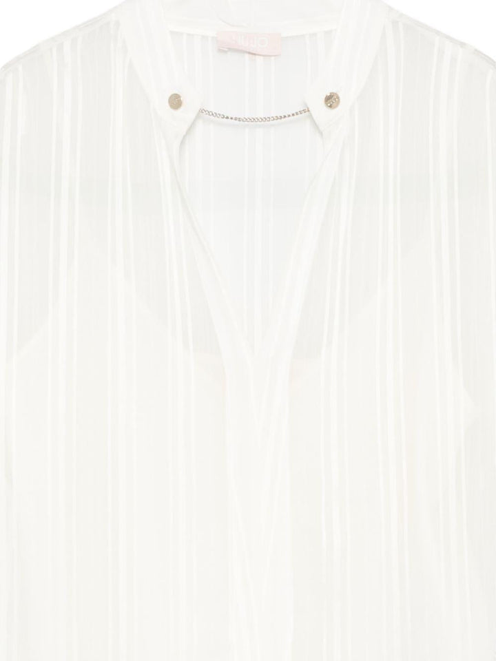 Blusa con scollo a V 