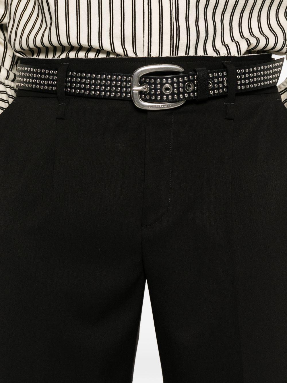 Pantaloni neri con pieghe e passanti 