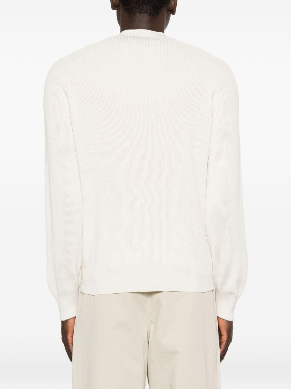 Cardigan beige con scollo a V 