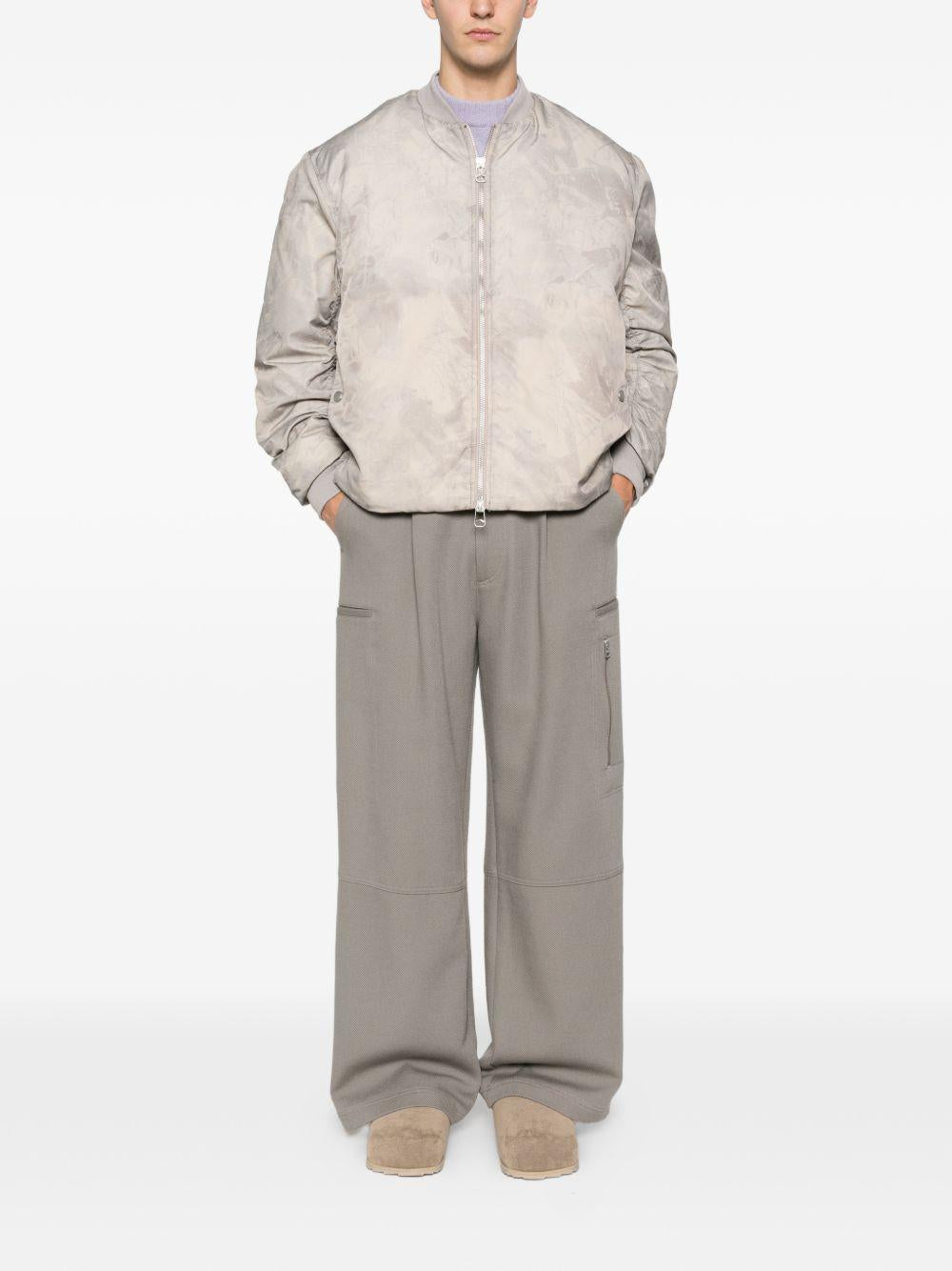 Bomber a colori neutri con zip 