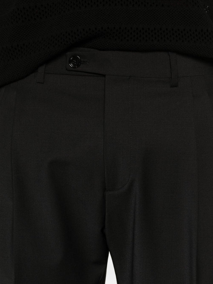 Pantaloni neri con risvolto 