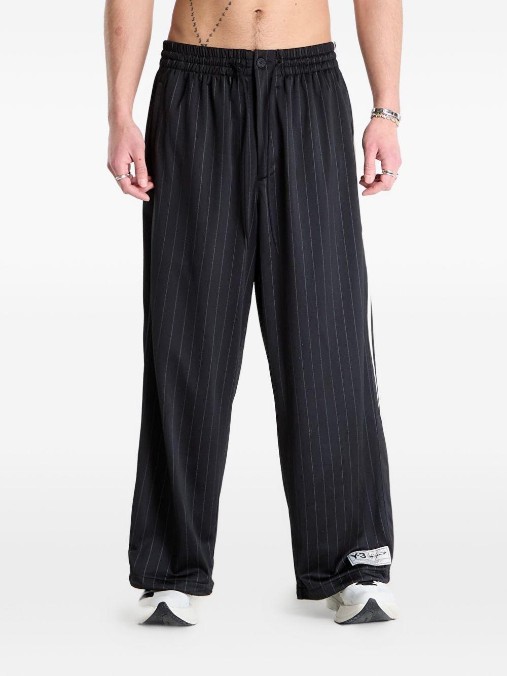 Pantaloni sportivi gessati neri 